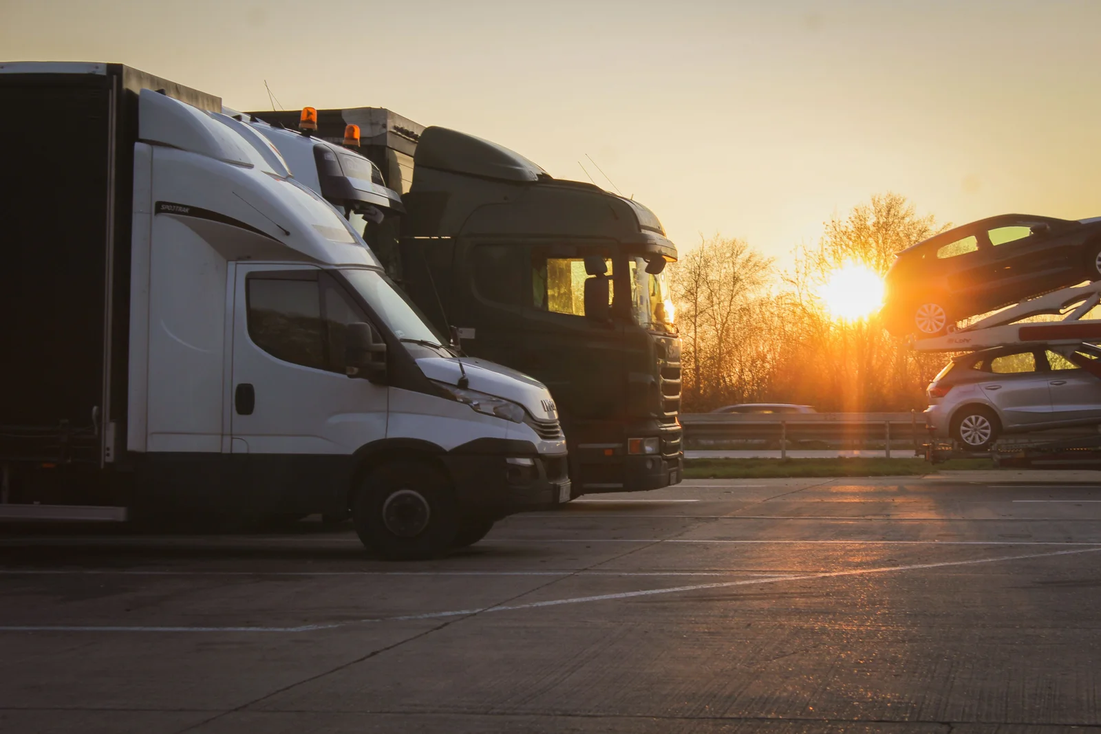 Vehicle transporters parked at a transportation hub